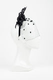 Black leather flower and laser cut headband with veil by Amanda Dudley Millinery